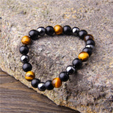THREE-STONE BRACELET WITH TIGER EYE, HEMATITE AND BLACK OBSIDIAN