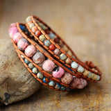 LEATHER WRAP BRACELET WITH PINK RHODONITE