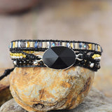 BLACK WRAP BRACELET WITH PYRAMID ONYX