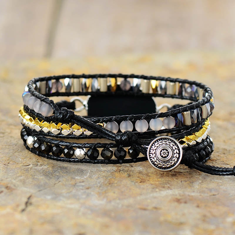 BLACK WRAP BRACELET WITH PYRAMID ONYX