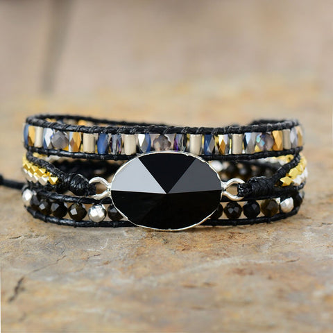 BLACK WRAP BRACELET WITH PYRAMID ONYX