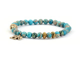 NATURAL STONE BUDDHA AND ELEPHANT BEAD BRACELET