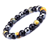 THREE-STONE BRACELET WITH AMBER GOLD TIGER EYE, HEMATITE AND BLACK ONYX