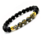 BRACELET WITH LAVA STONE AND BLACK-GOLD MALACHITE