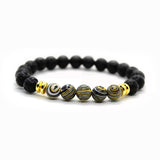 BRACELET WITH LAVA STONE AND BLACK-GOLD MALACHITE