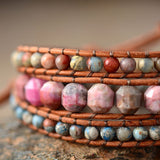 LEATHER WRAP BRACELET WITH PINK RHODONITE